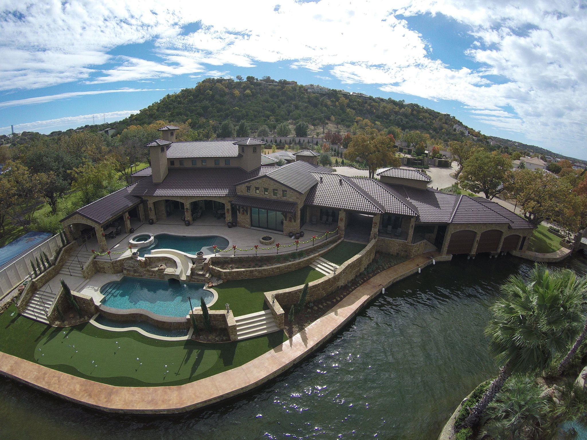 Highland Lakes Heating & Air technicians installing HVAC equipment in a covered boat dock on the Highland Lakes — we service every property type